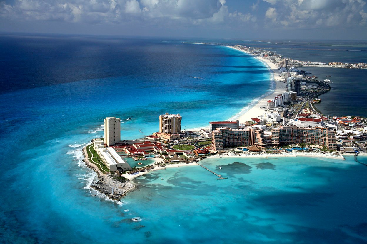 Aerial view Cancun Hotel Zone Caribbean turquoise waters beachfront resorts Mexico