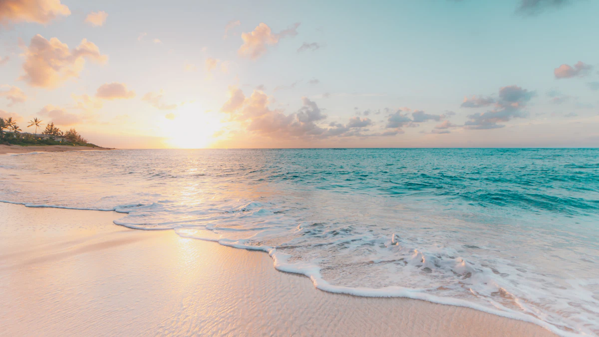 Turquoise water and white sand beach in Isla Mujeres at sunrise