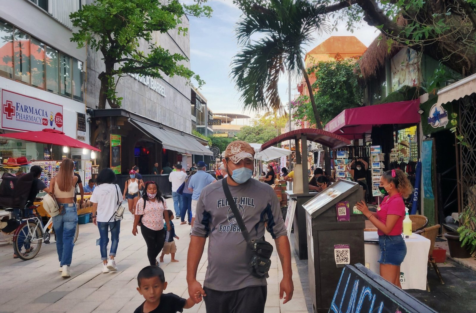 Pedestrians walking on Quinta Avenida in Playa del Carmen