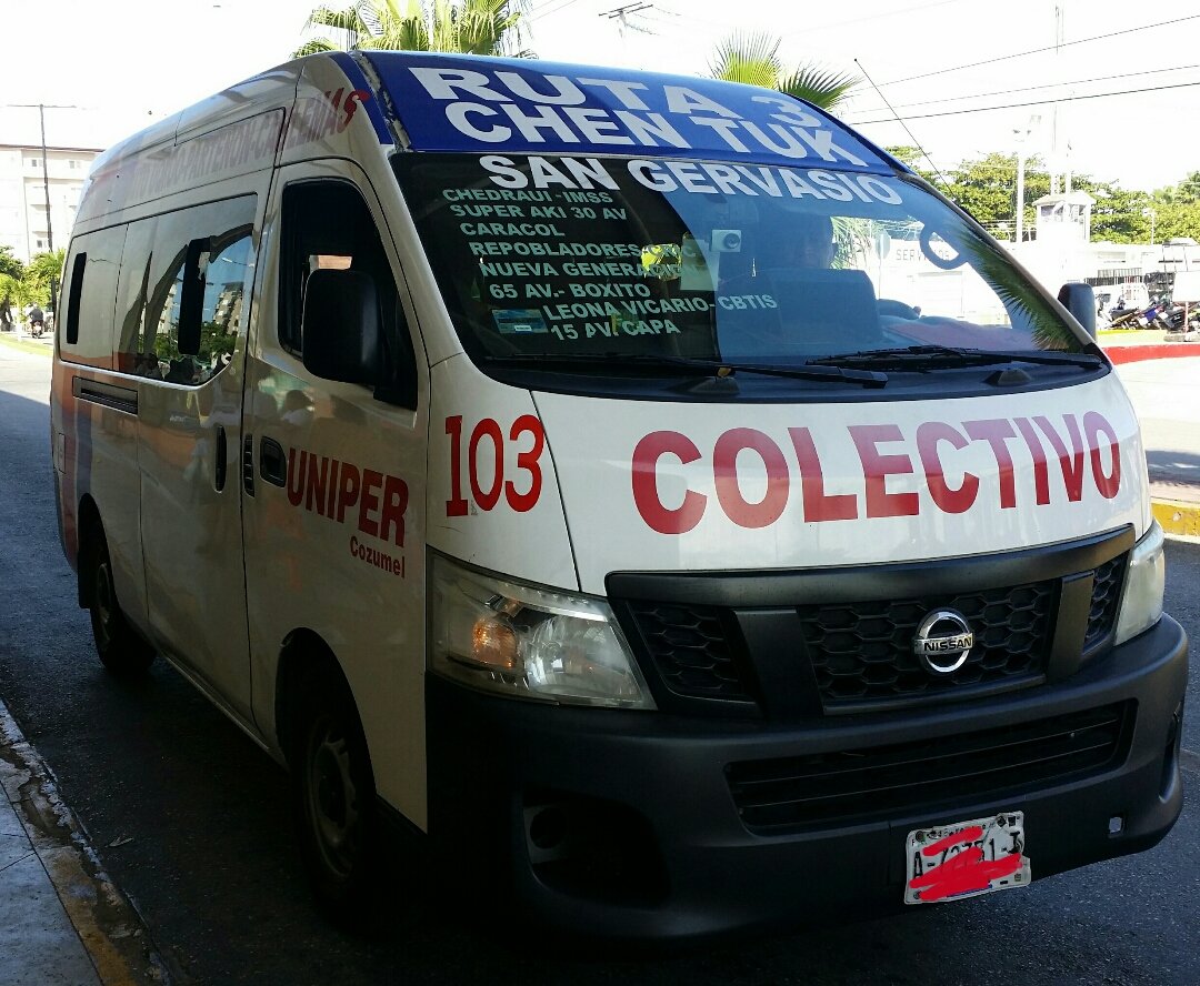 White Nissan NV350 Urvan shared colectivo van photographed in Cozumel, Quintana Roo, Mexico