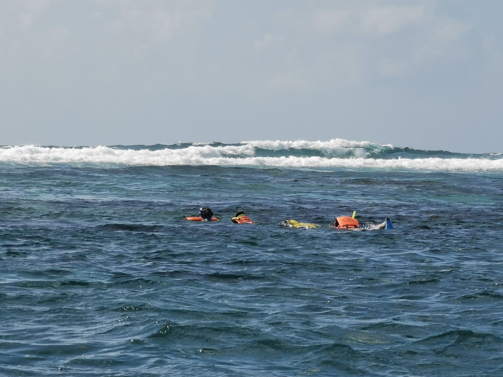 People snorkeling in the reef lagoon of Puerto Morelos, near Dreams Riviera Cancun
