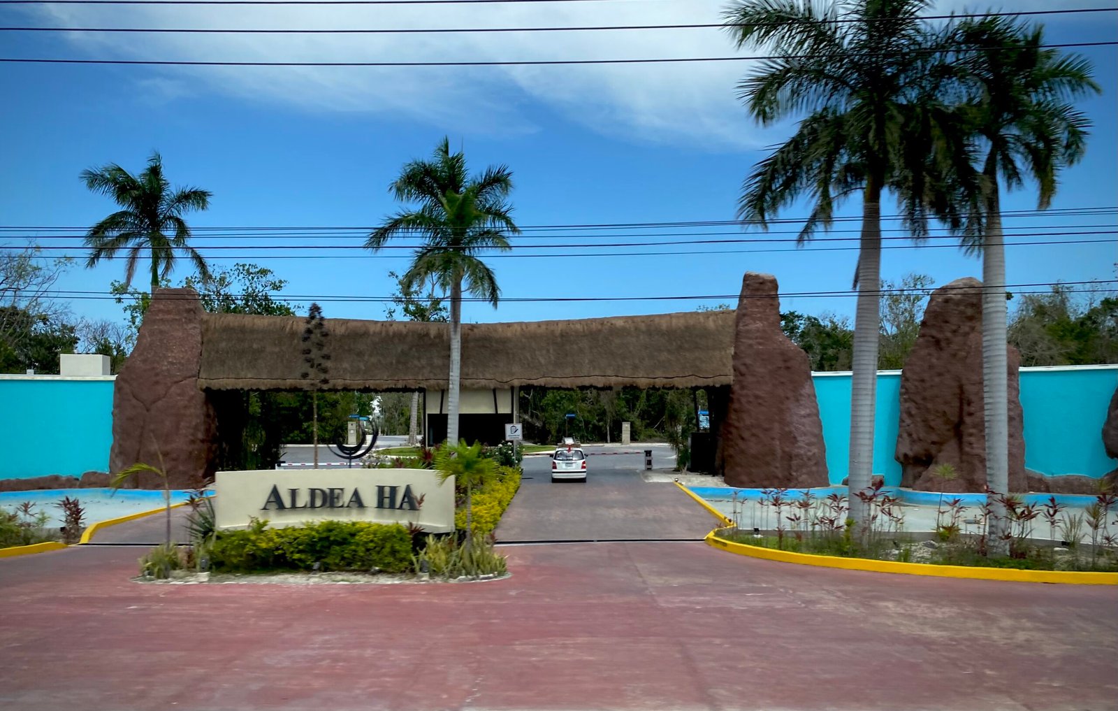 Palm-lined entrance along the Riviera Maya between Playa del Carmen and Cancún