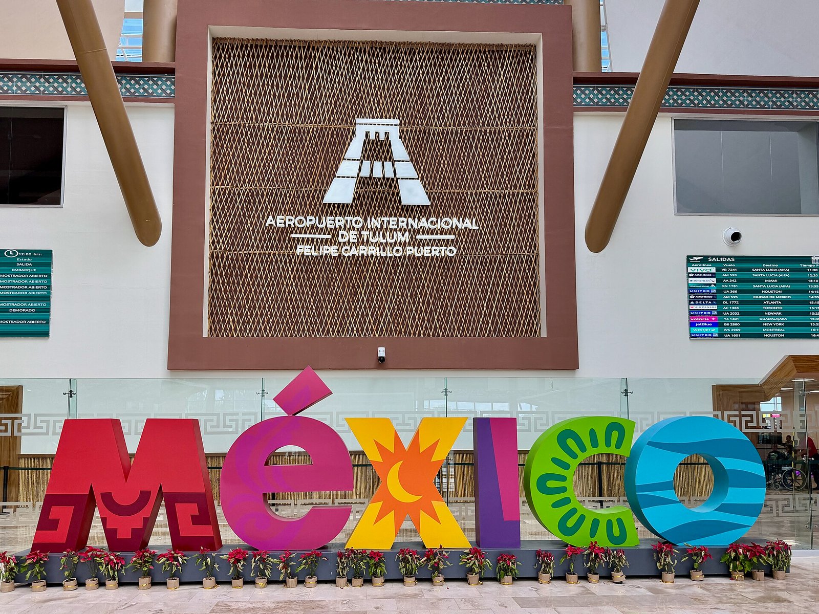 Entrance to Felipe Carrillo Puerto International Airport in Tulum with the colorful MEXICO letters