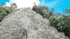 Nohoch Mul pyramid rising above the jungle at the Cobá archaeological site, Quintana Roo