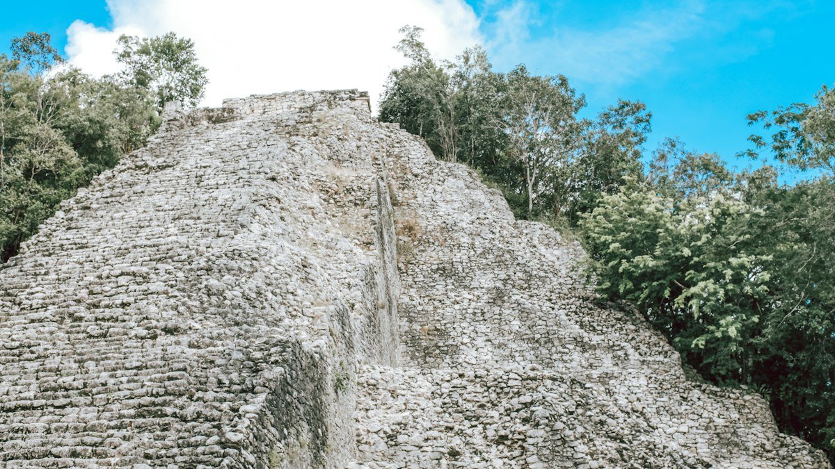 Nohoch Mul pyramid rising above the jungle at the Cobá archaeological site, Quintana Roo