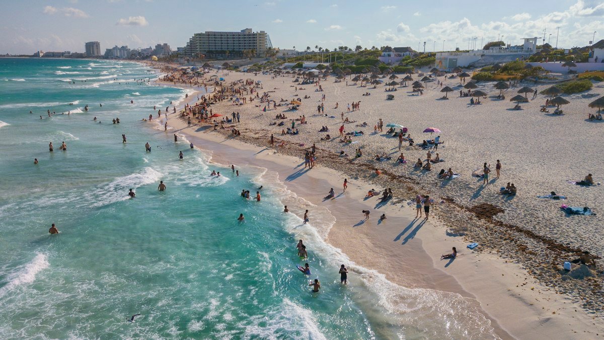 Swimmers in turquoise water at Punta Nizuc, the southern end of the Cancún Hotel Zone